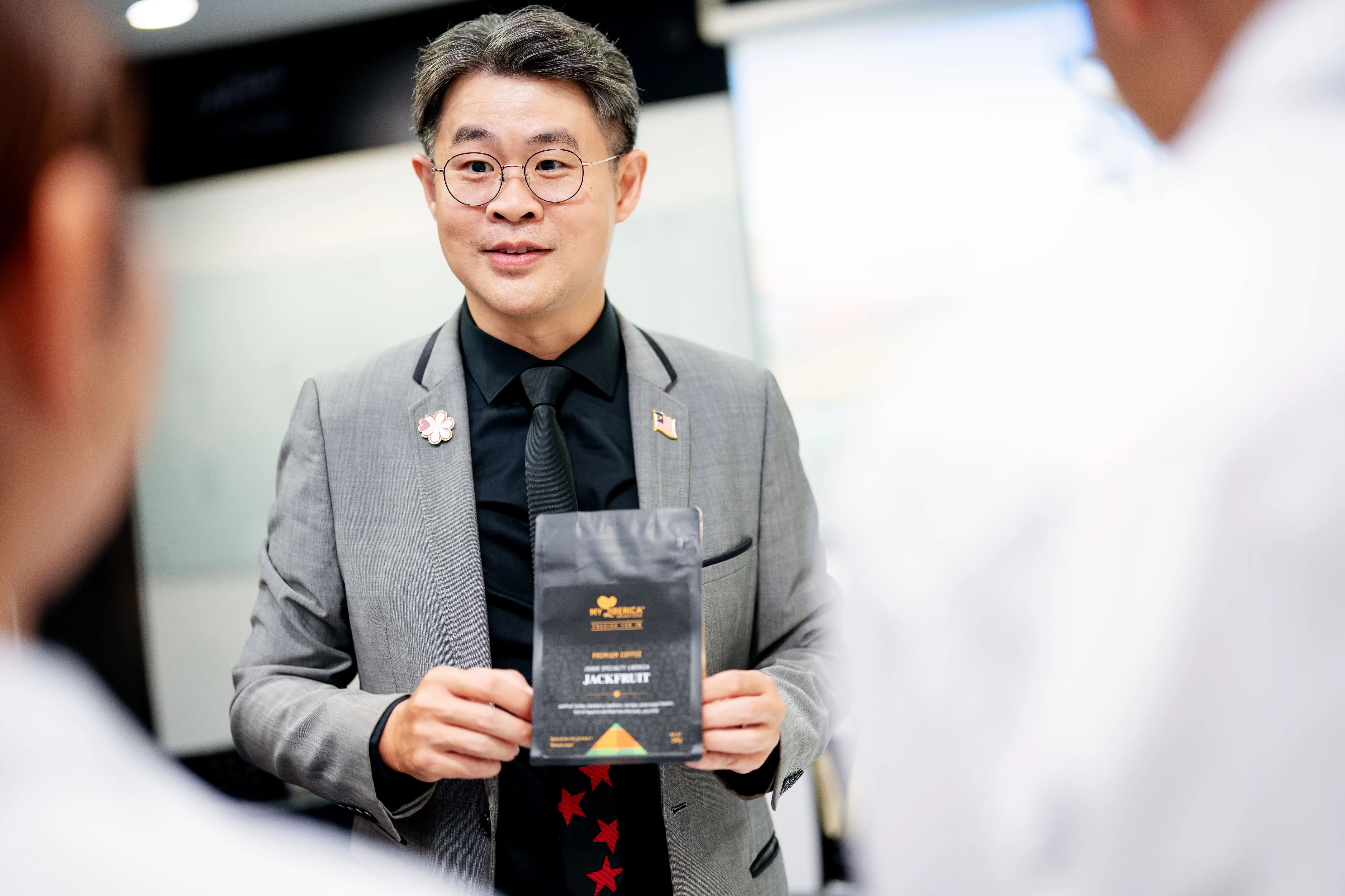 Lecturer presenting his project